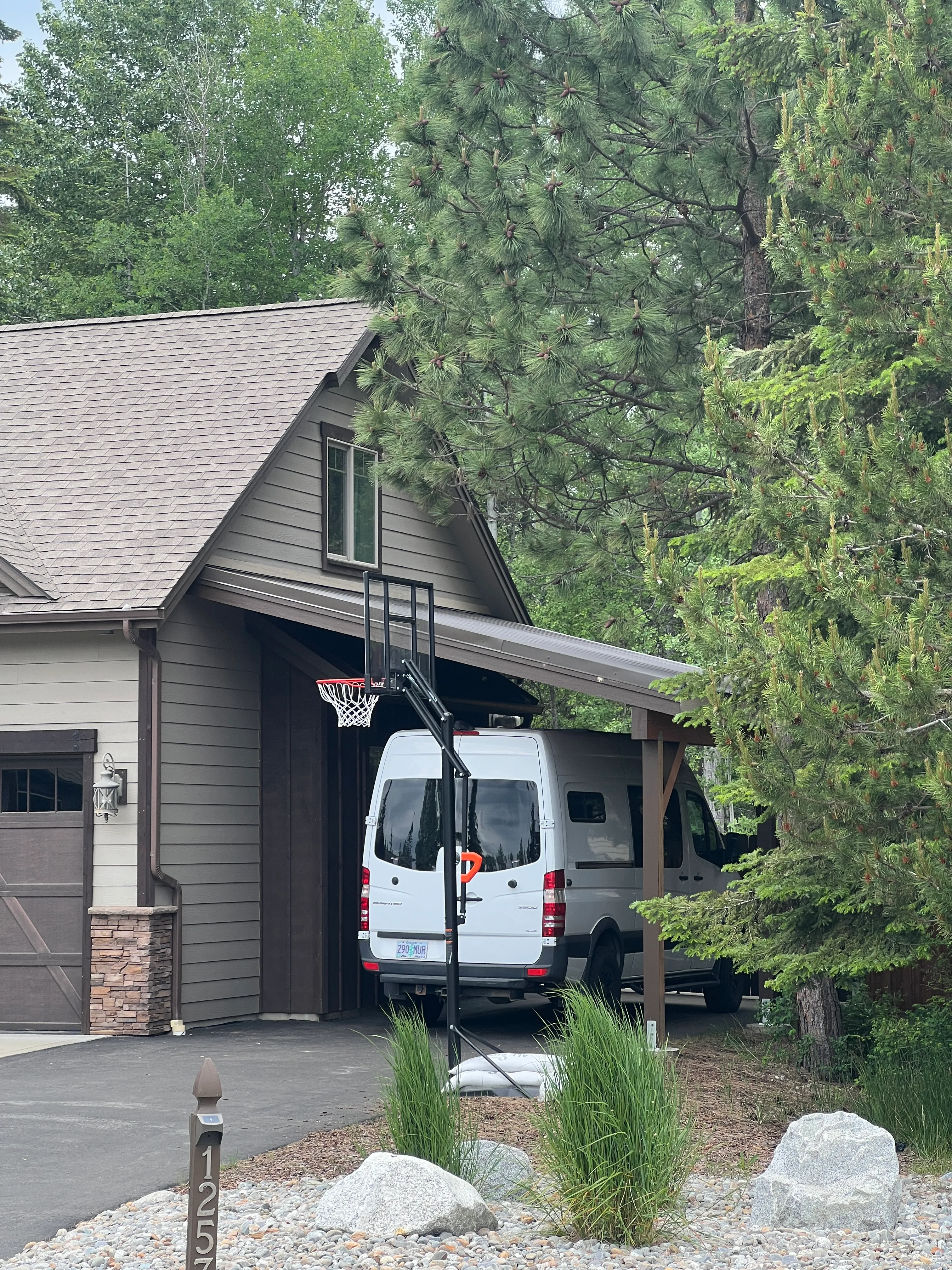 Completed lean-to with adventure van parked inside