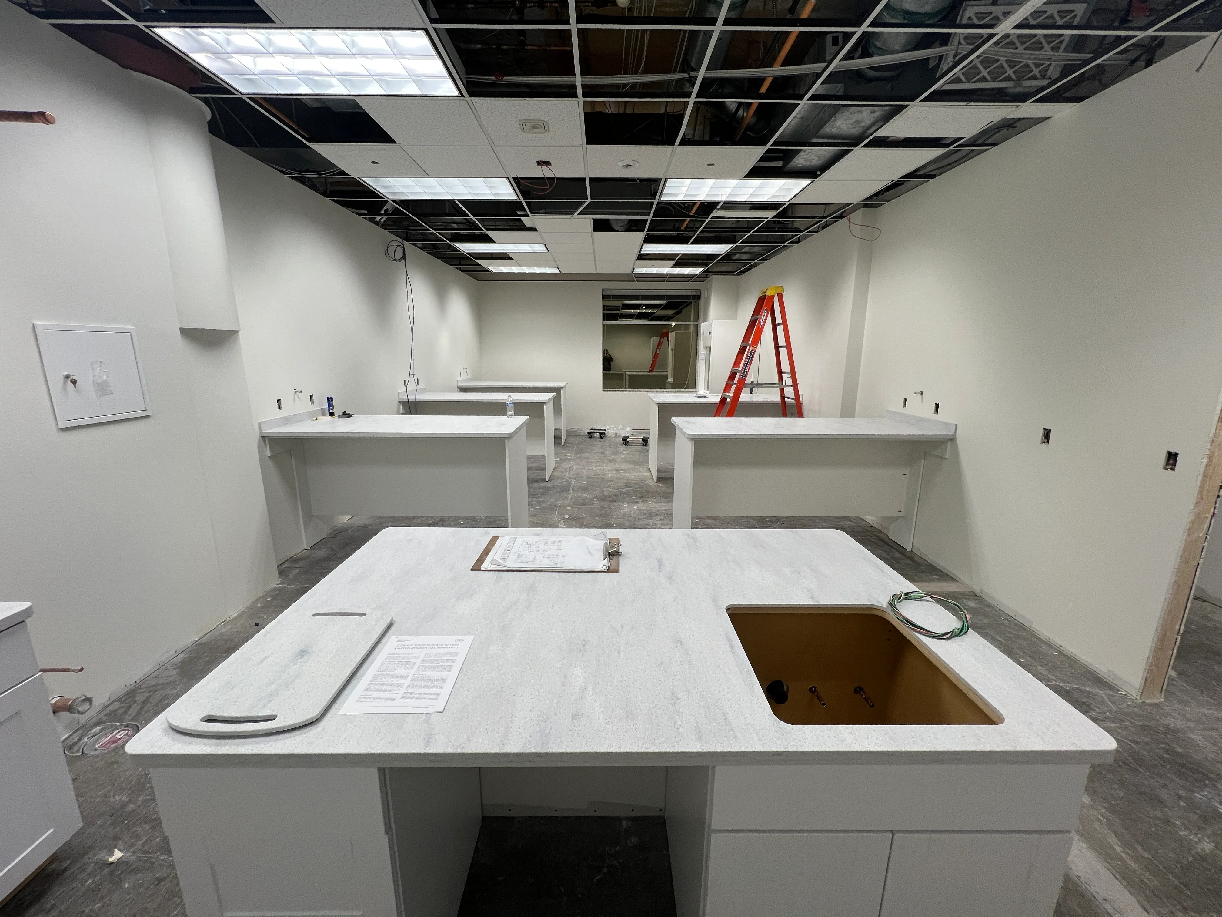 Science lab stations with quartz tops being installed