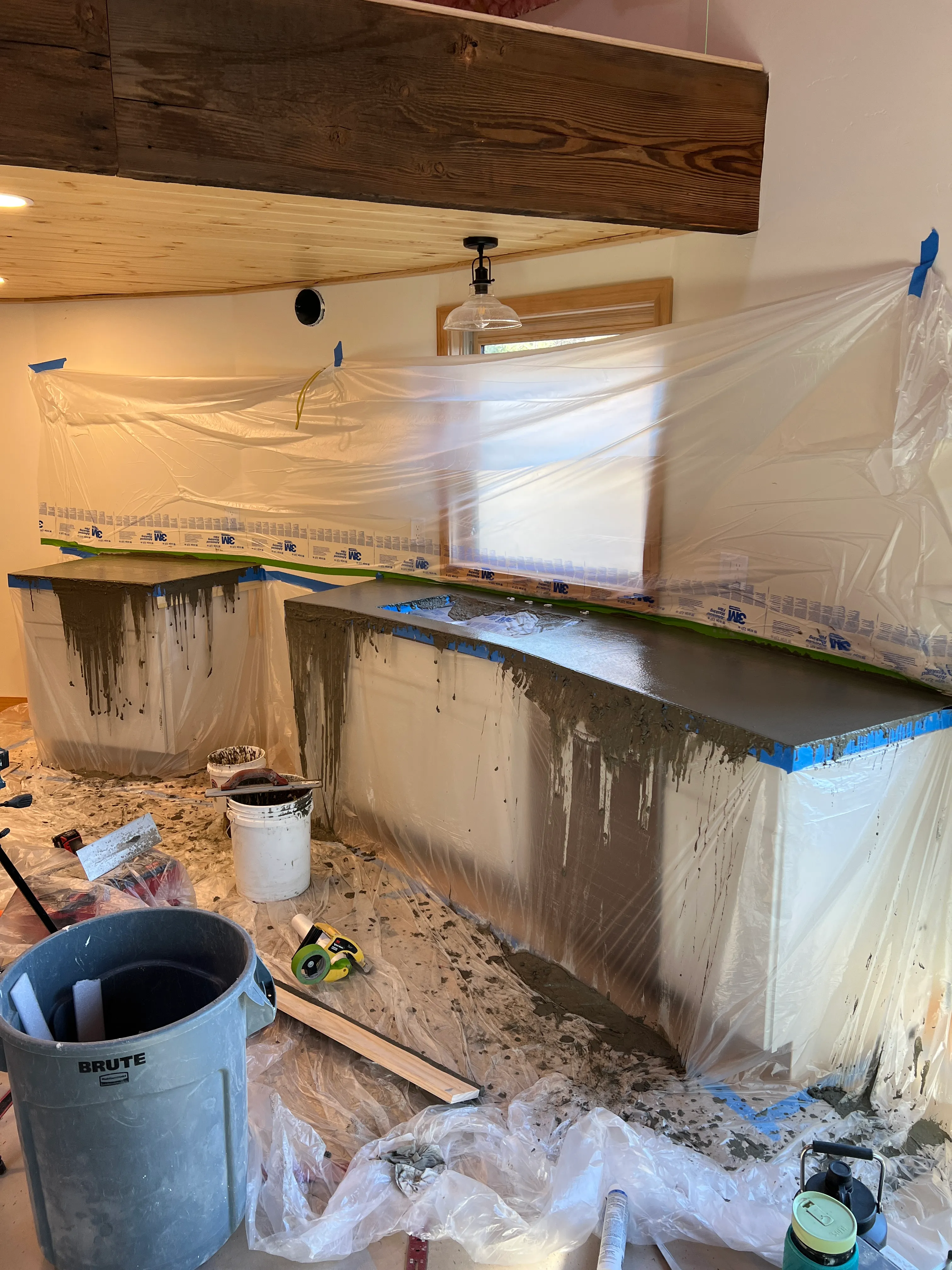 Concrete countertops masked off and curing
